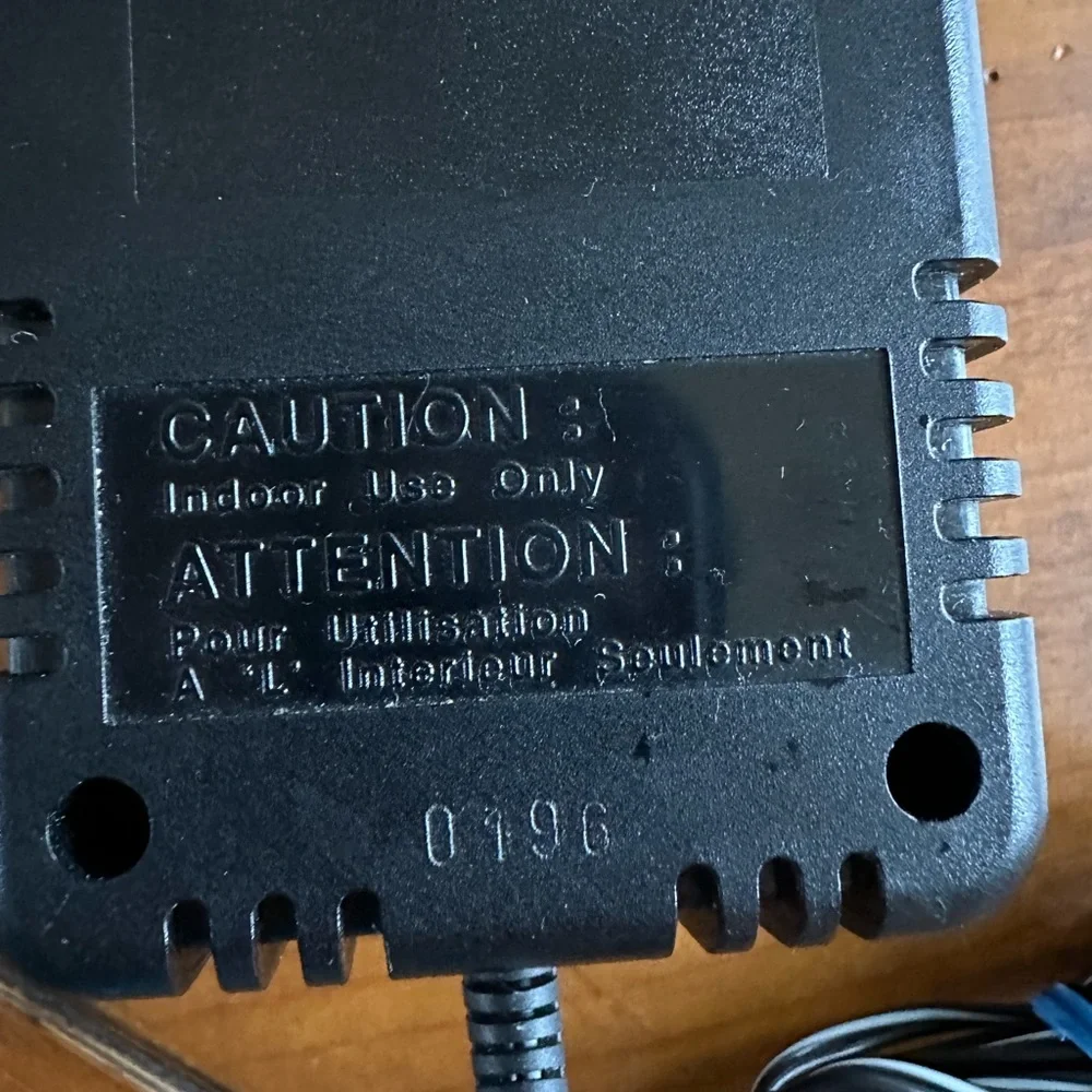Genuine Canon AD-300S power supply input: 120V ~ 60 Hz 24W output: 13.5V 1.0A